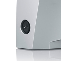 Graues Gerät mit rundem Ein- und Ausschalter, Nahaufnahme, Detailaufnahme