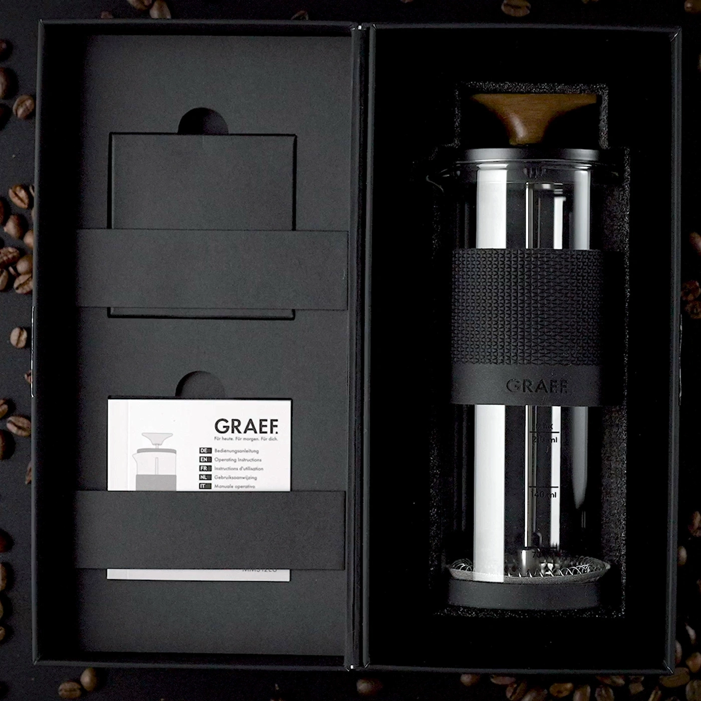 GRAEF coffee maker in a black gift box with coffee beans.