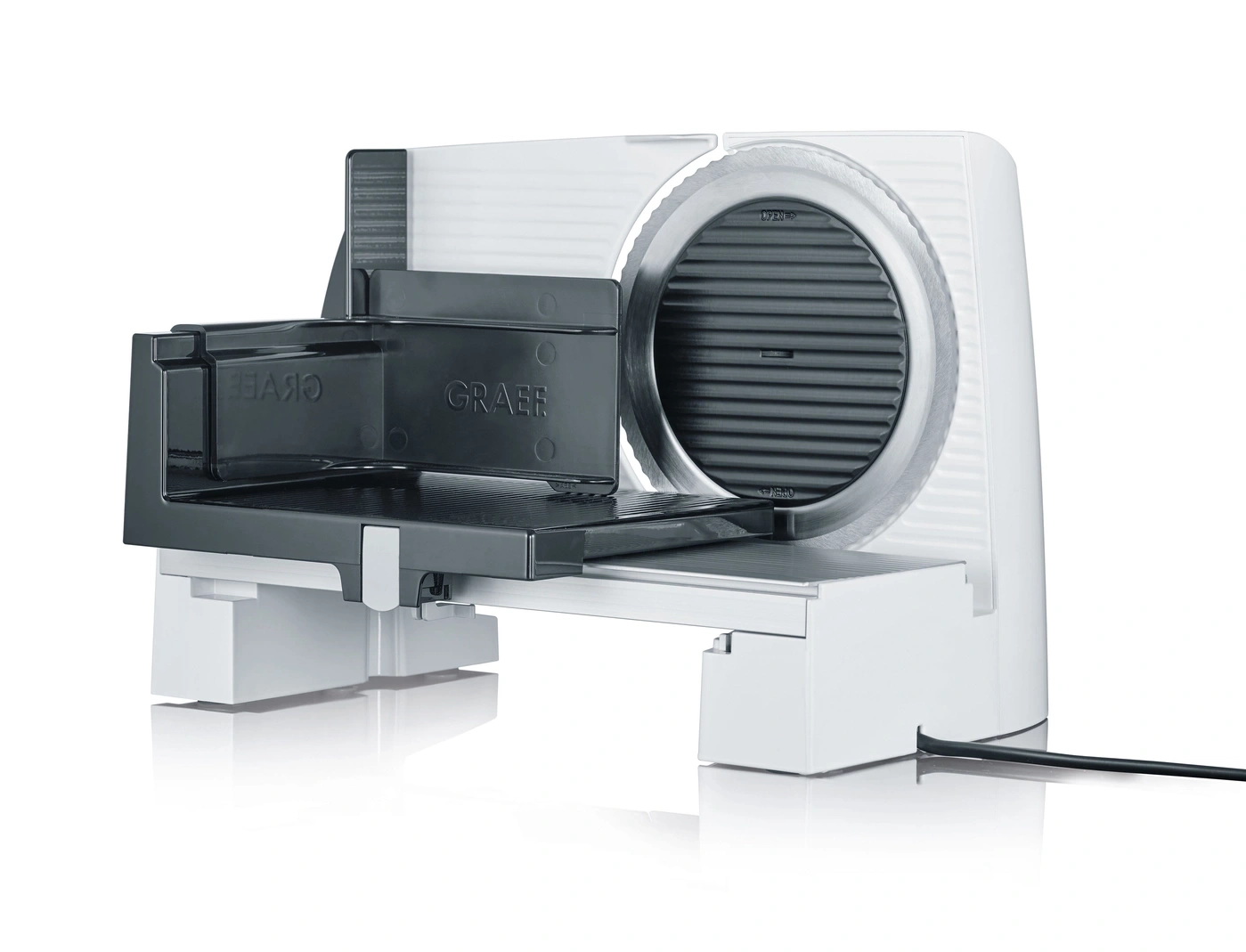 White Graef food slicer with black carriage and blade, perfect for slicing food items.