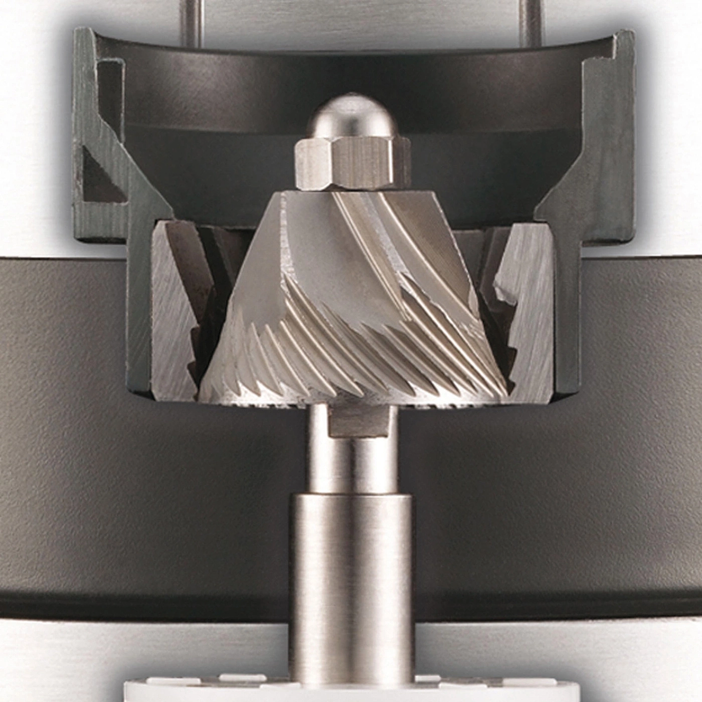 Close-up view of a grinder burr with precision metal cutting edges.