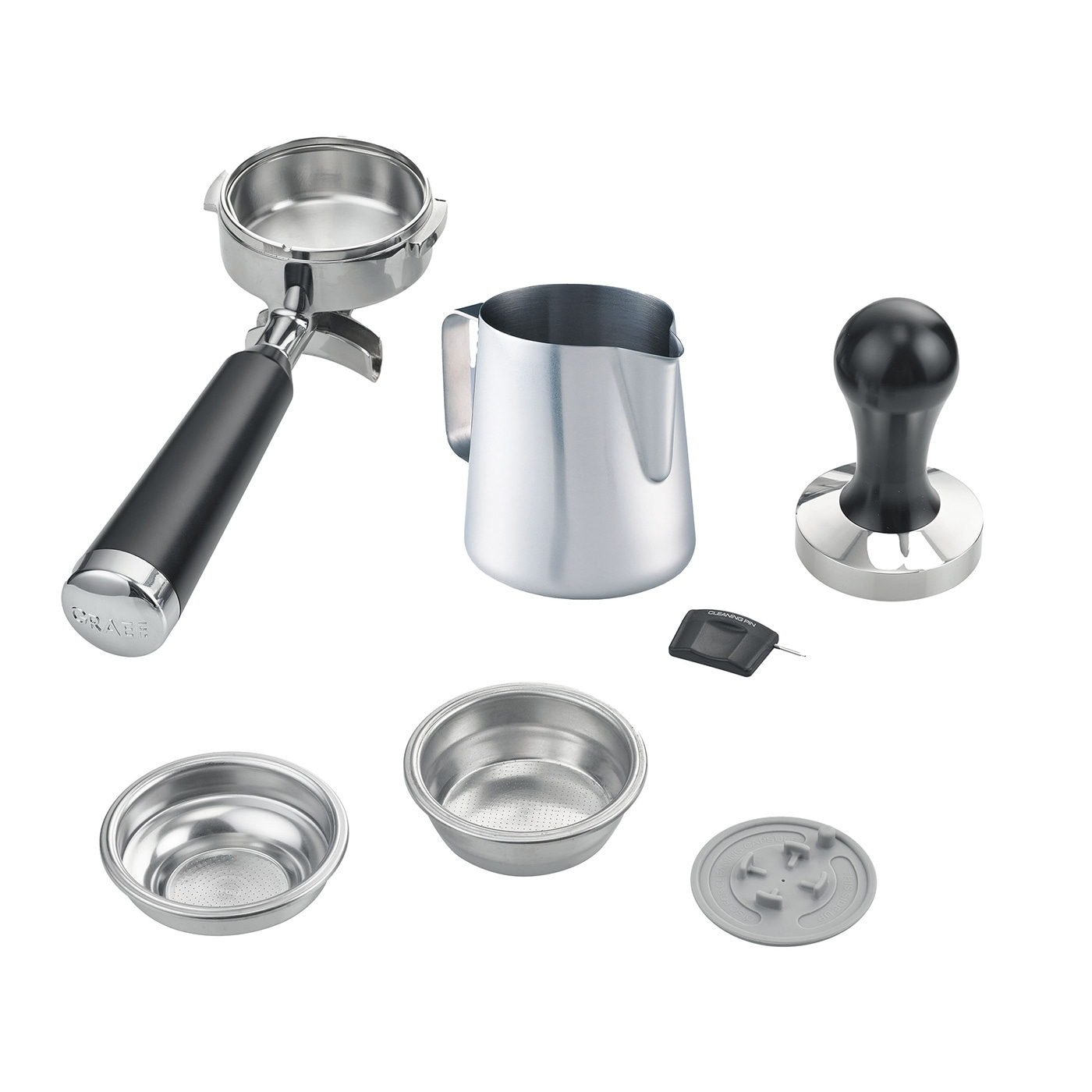 Coffee machine accessories: portafilter, milk jug, tamper, filters, cleaning pin, lid.