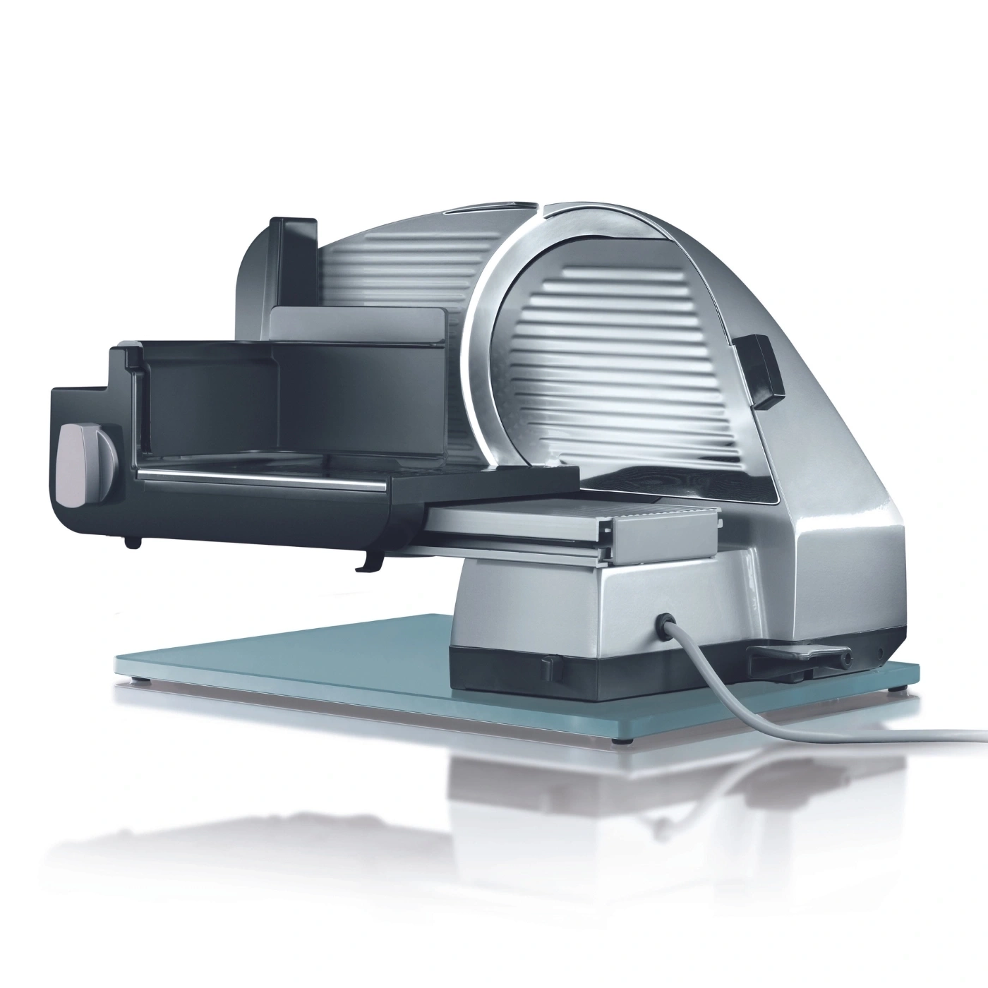 Electric slicer, silver, with blade and base, isolated on white background, kitchen appliance
