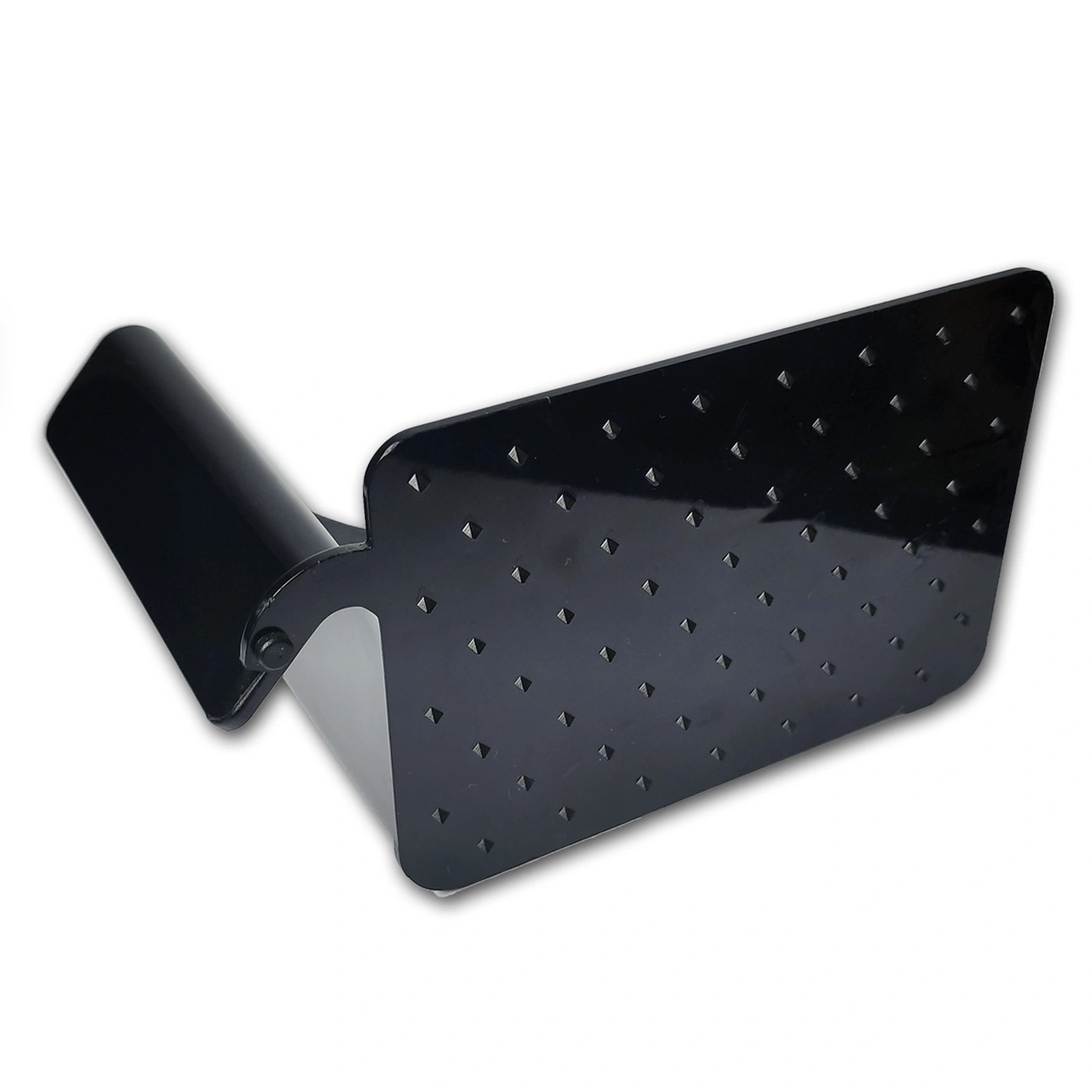 Black plastic part with pyramidal protrusions and cylindrical handle