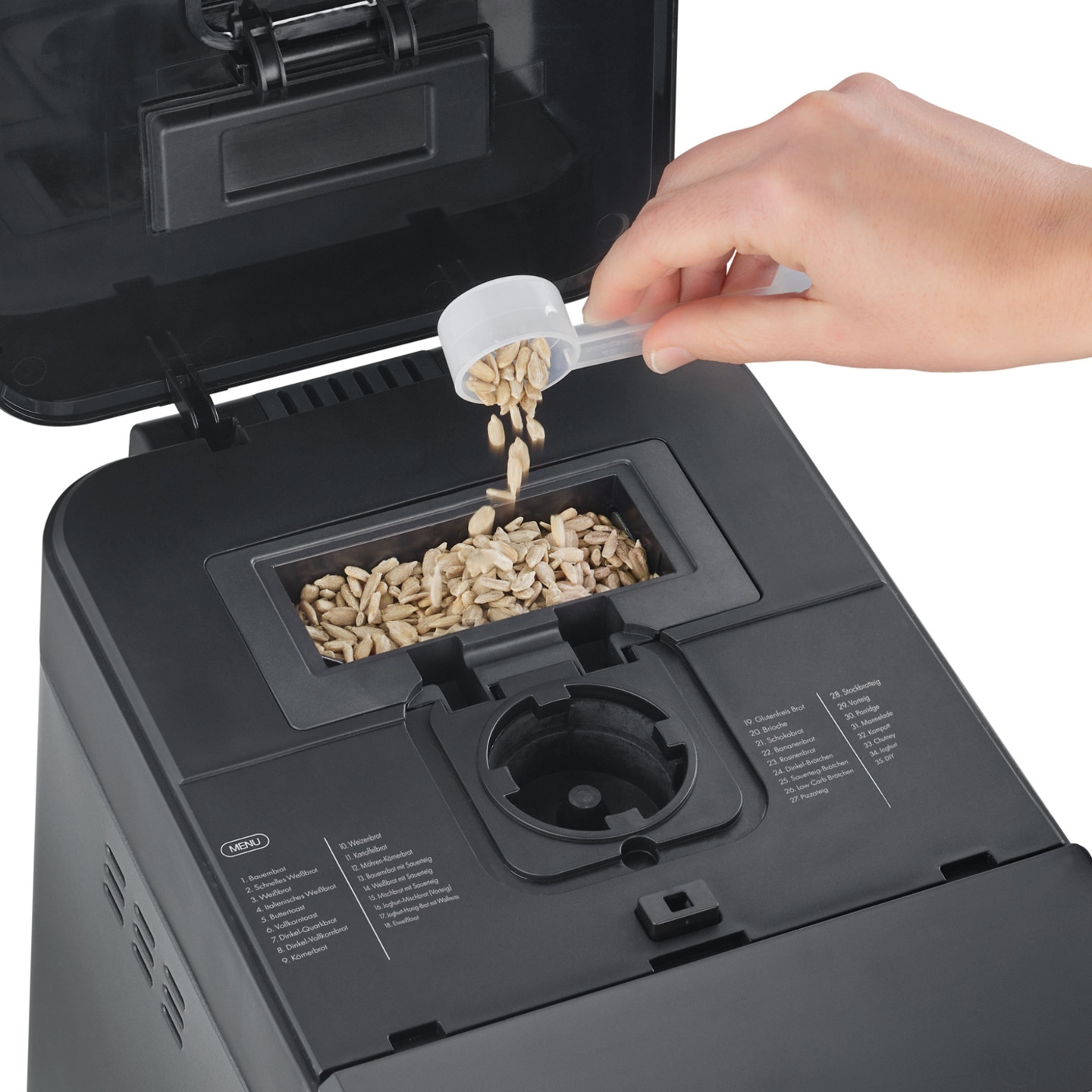 Bread maker with ingredients, hand, spoon, grains, menu, baking, kitchen, food