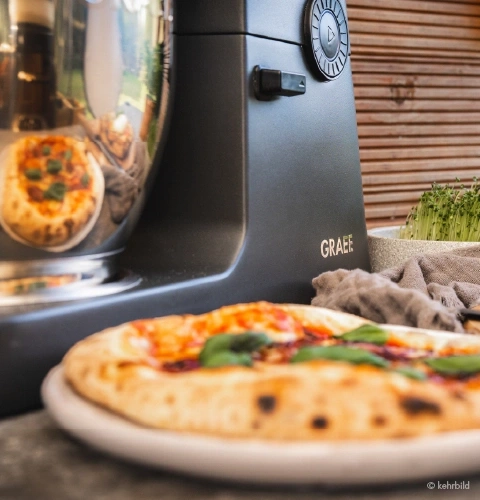 The stand mixer is in the outdoor kitchen; bake your own pizza