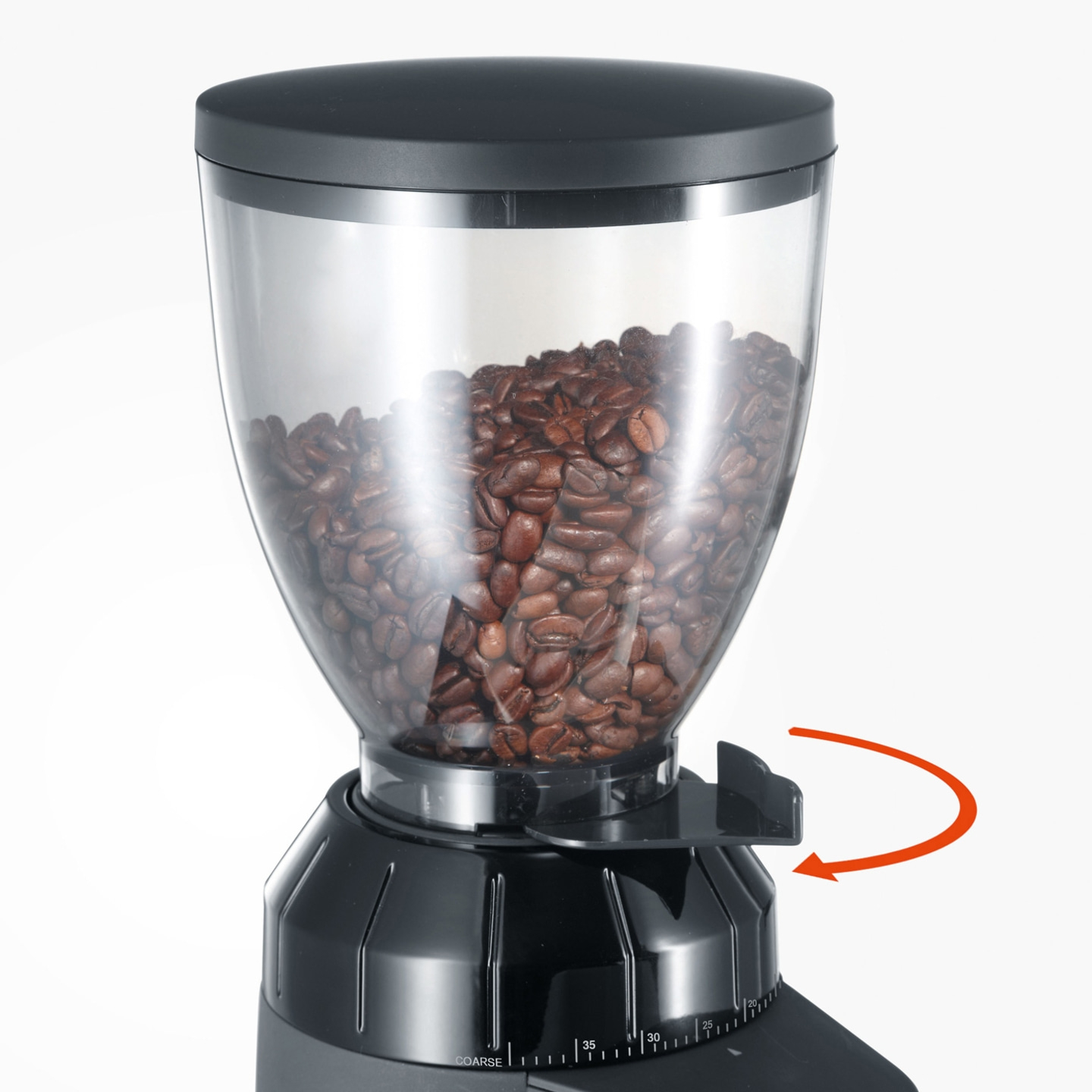 Kaffeemühle mit Bohnen, schwarzer Behälter, Mahlgrad einstellbar, Pfeil zeigt Richtung