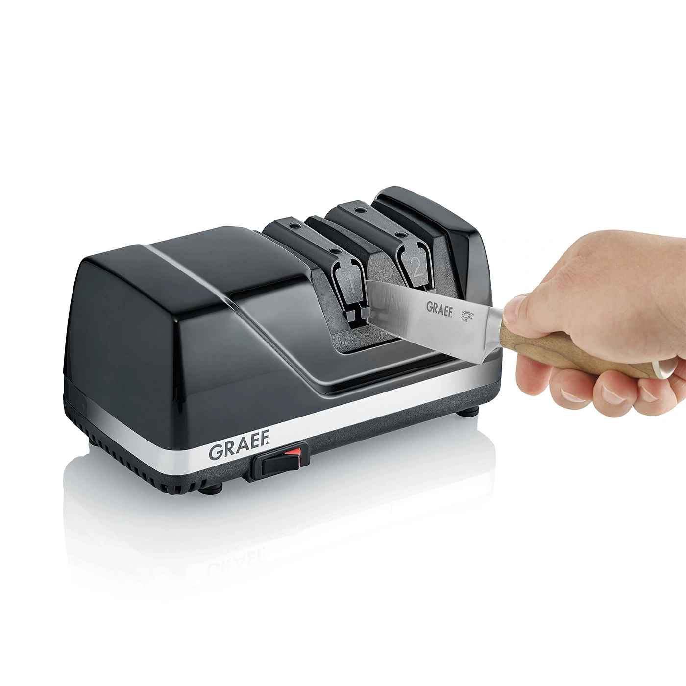 Knife sharpener, electric, black, with knife, hand, GRAEF, sharpening, kitchen