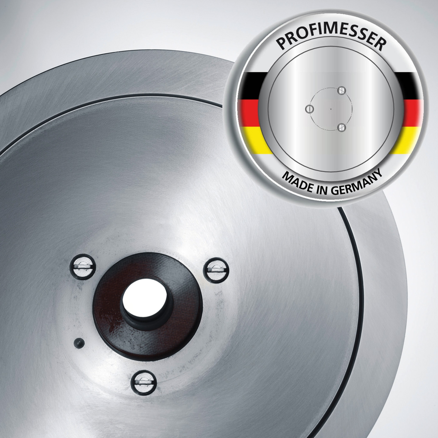Metallplatte mit Logo 'PROFIMESSER' und 'Made in Germany' in Nahaufnahme.