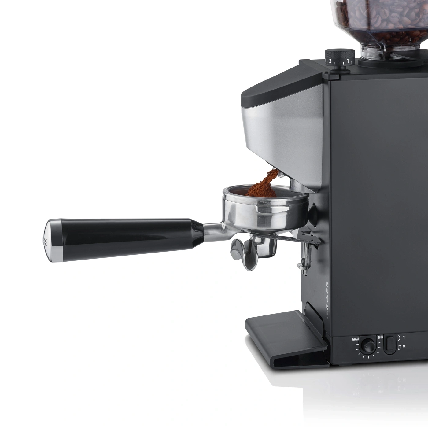 Coffee grinder with portafilter, coffee beans, and black housing