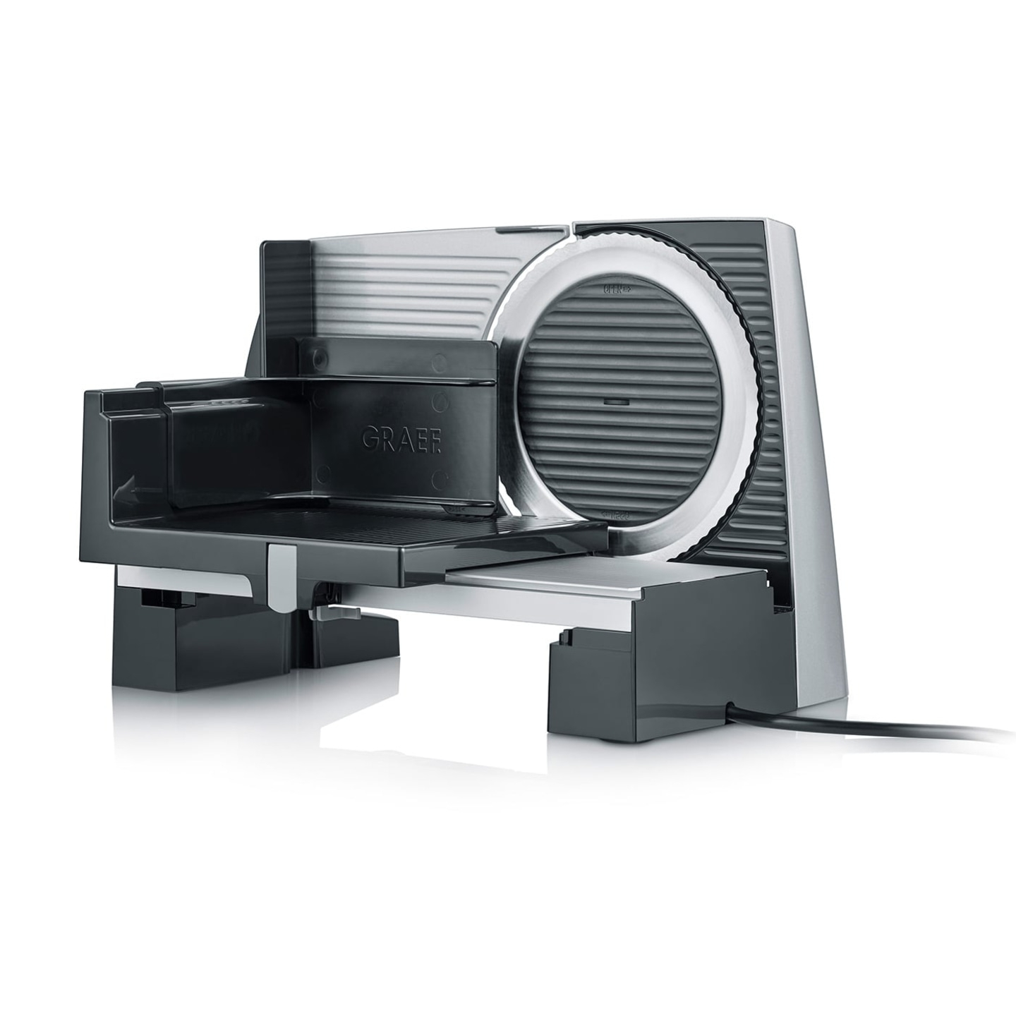 Graef electric food slicer, silver and black, close-up, isolated on white