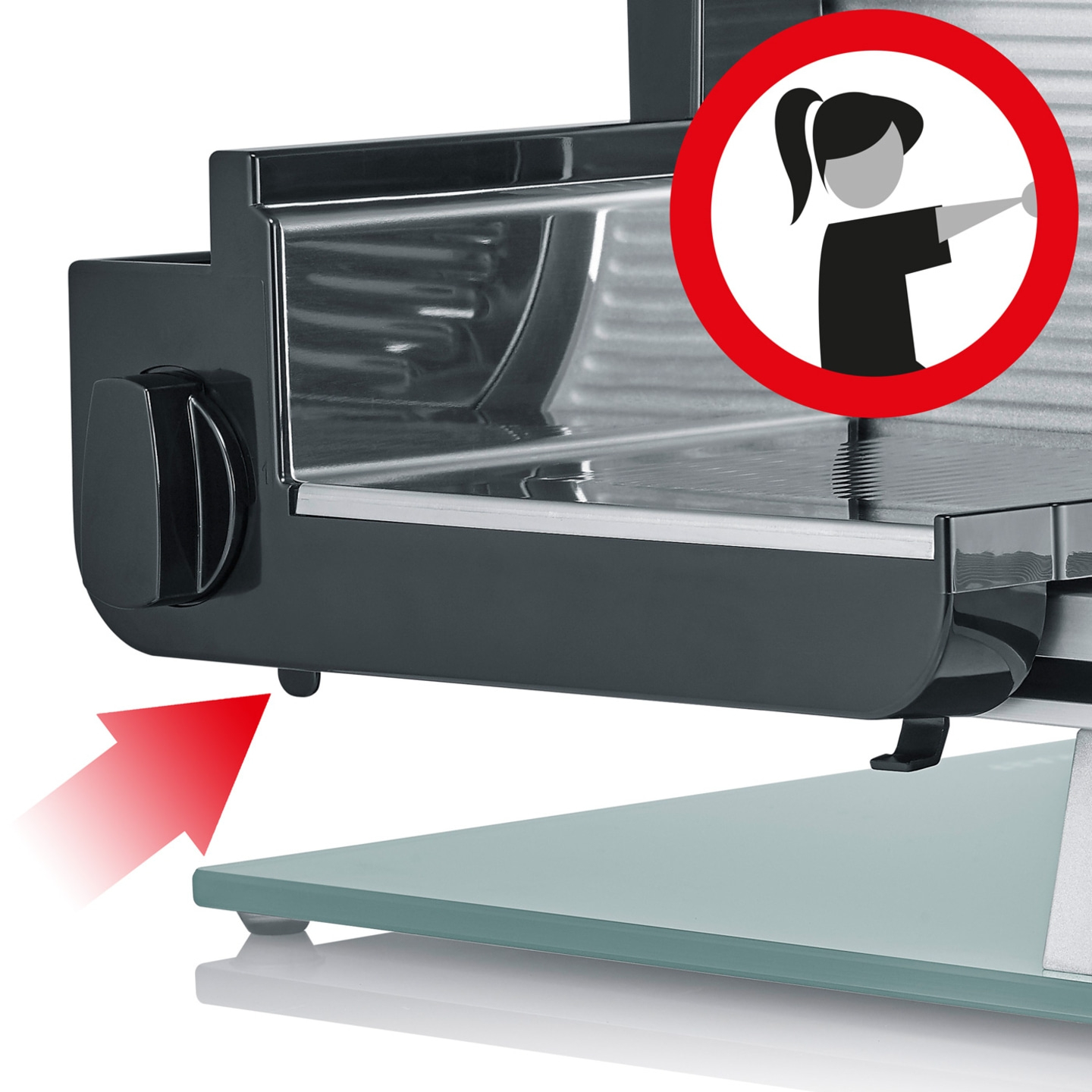 Meat slicer with red arrow and safety warning symbol for use