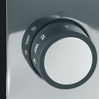 Drehknopf mit Zahlen und einem Dreieck, das auf eine Einstellung zeigt.