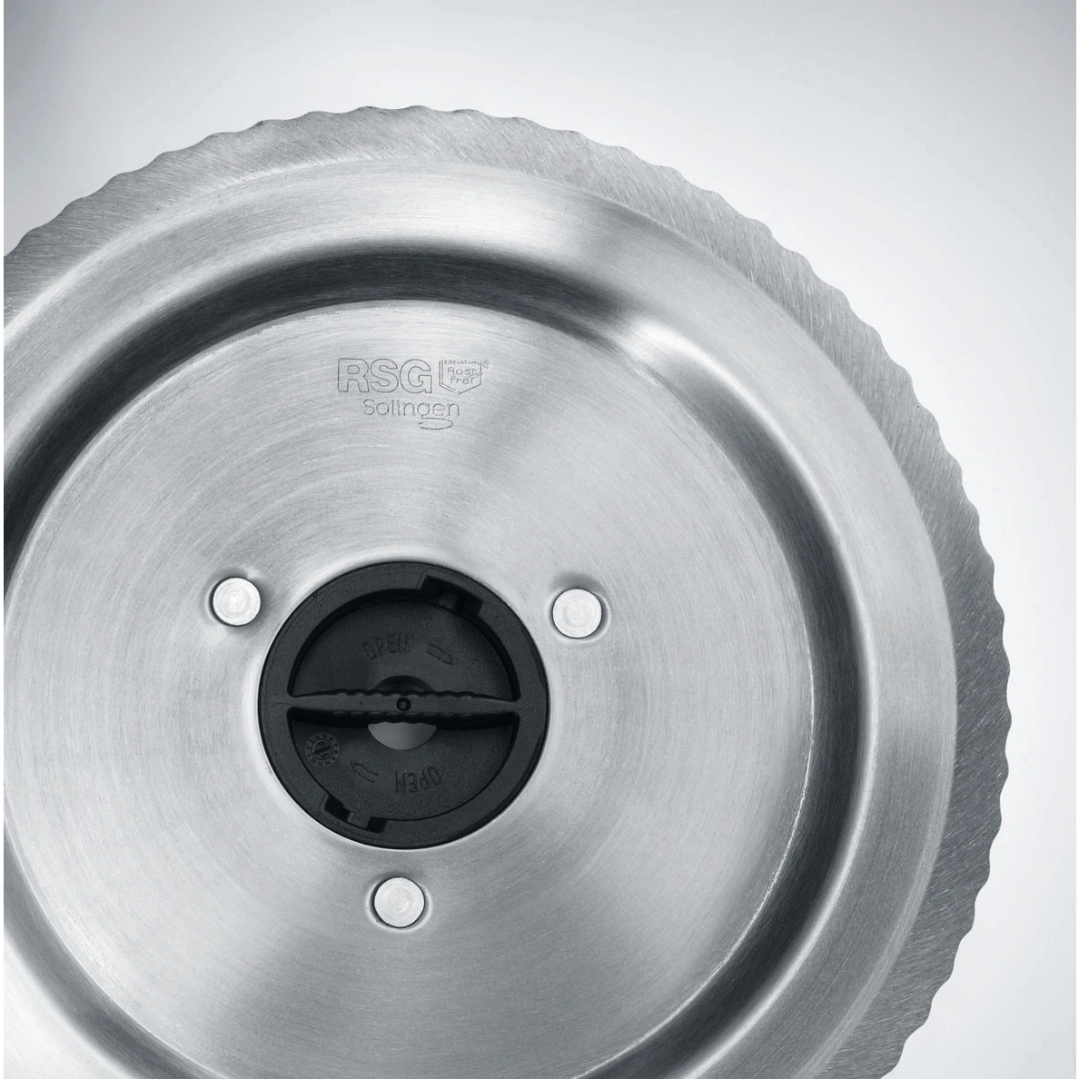 Metal circular saw blade with black twist lock and RSG Solingen logo.