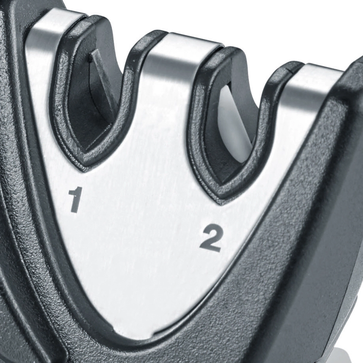Close-up of a knife sharpener showing numbers 1 and 2.