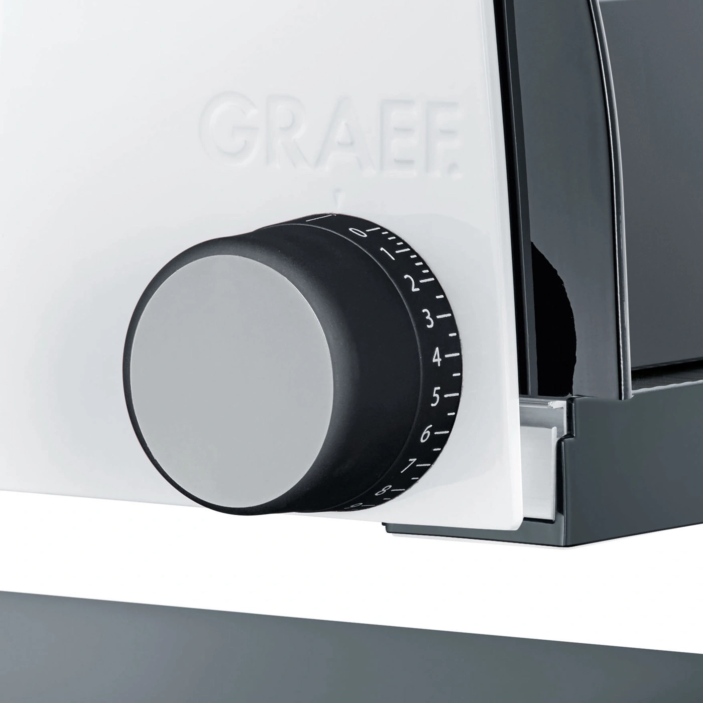Close-up of a Graef slicer with adjustment knob