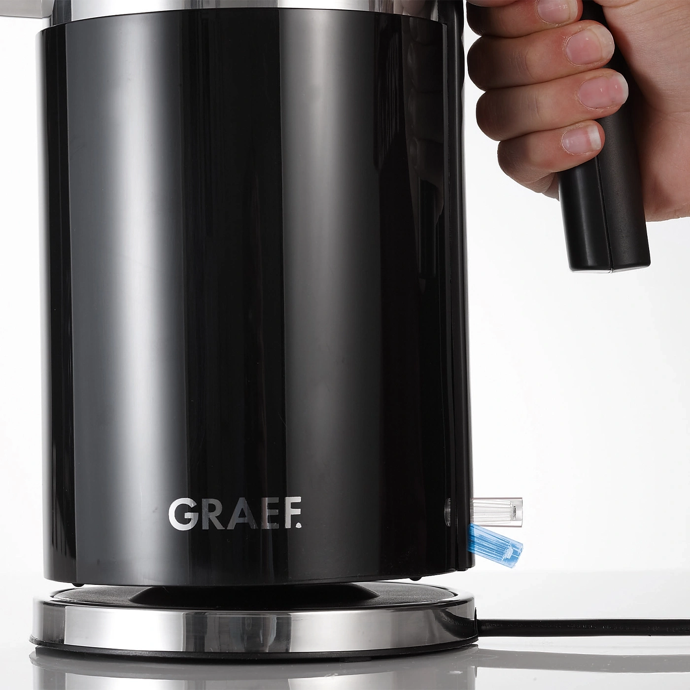 Black kettle with GRAEF logo, handle, and a blue transparent element.