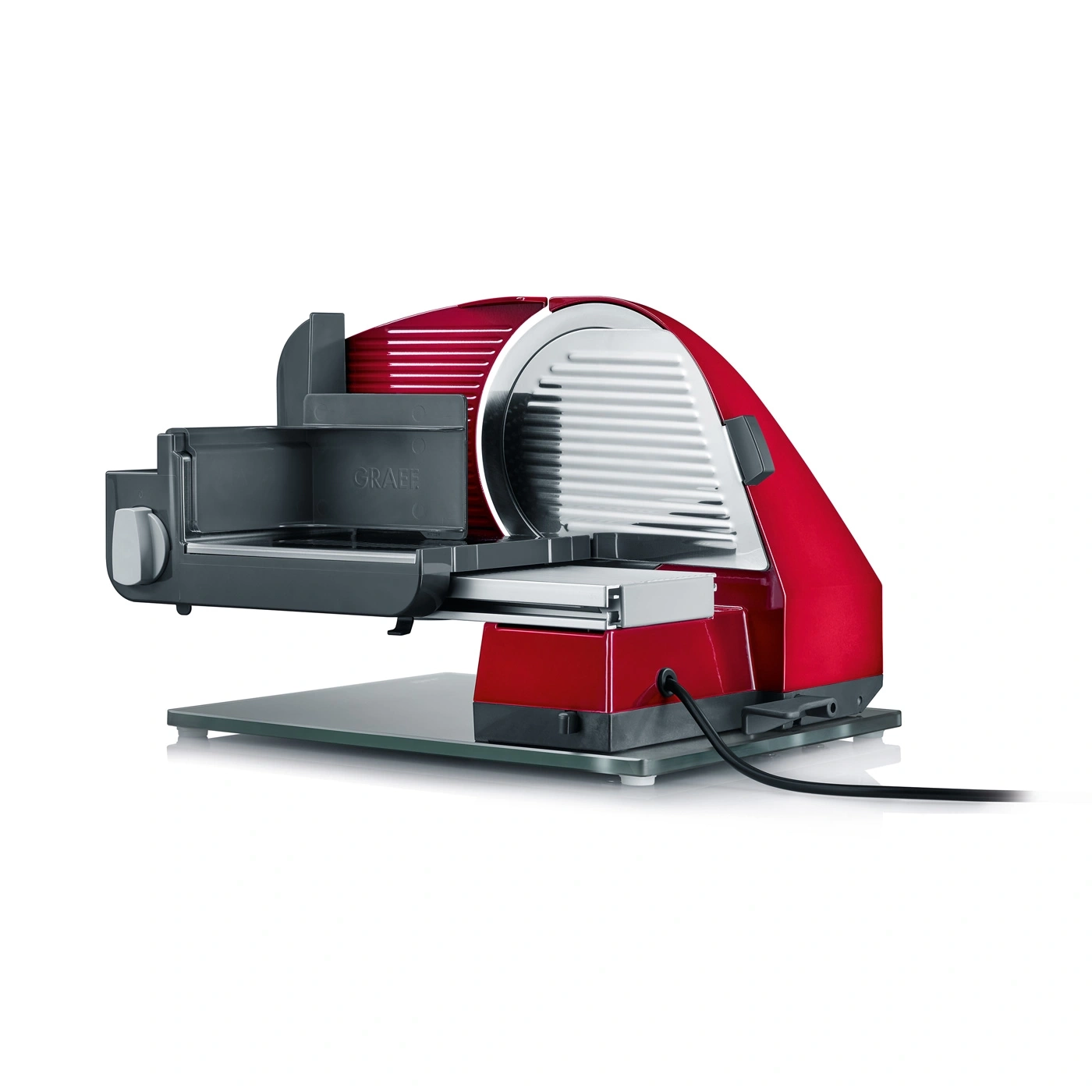 Red electric slicer, Graef brand, with glass plate and power cord, ready to slice.