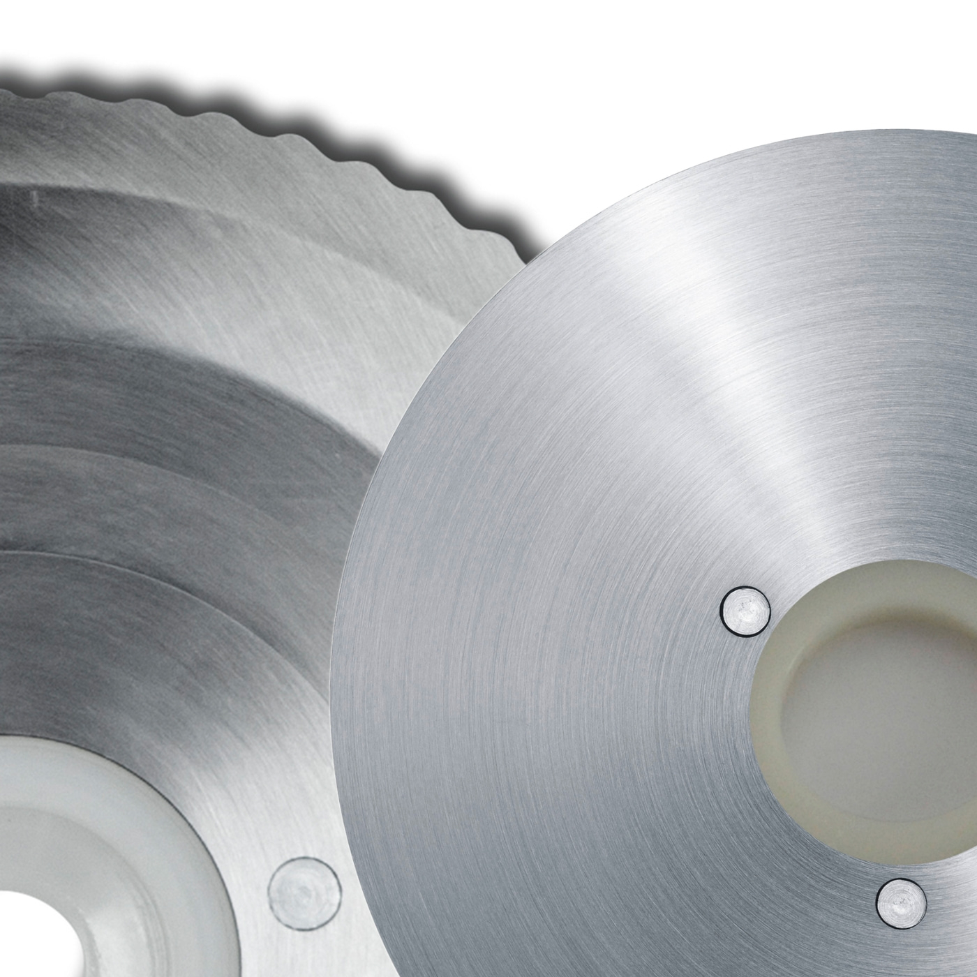 Close-up of metal circular saw blades, sharp teeth, shiny surface, industrial tools