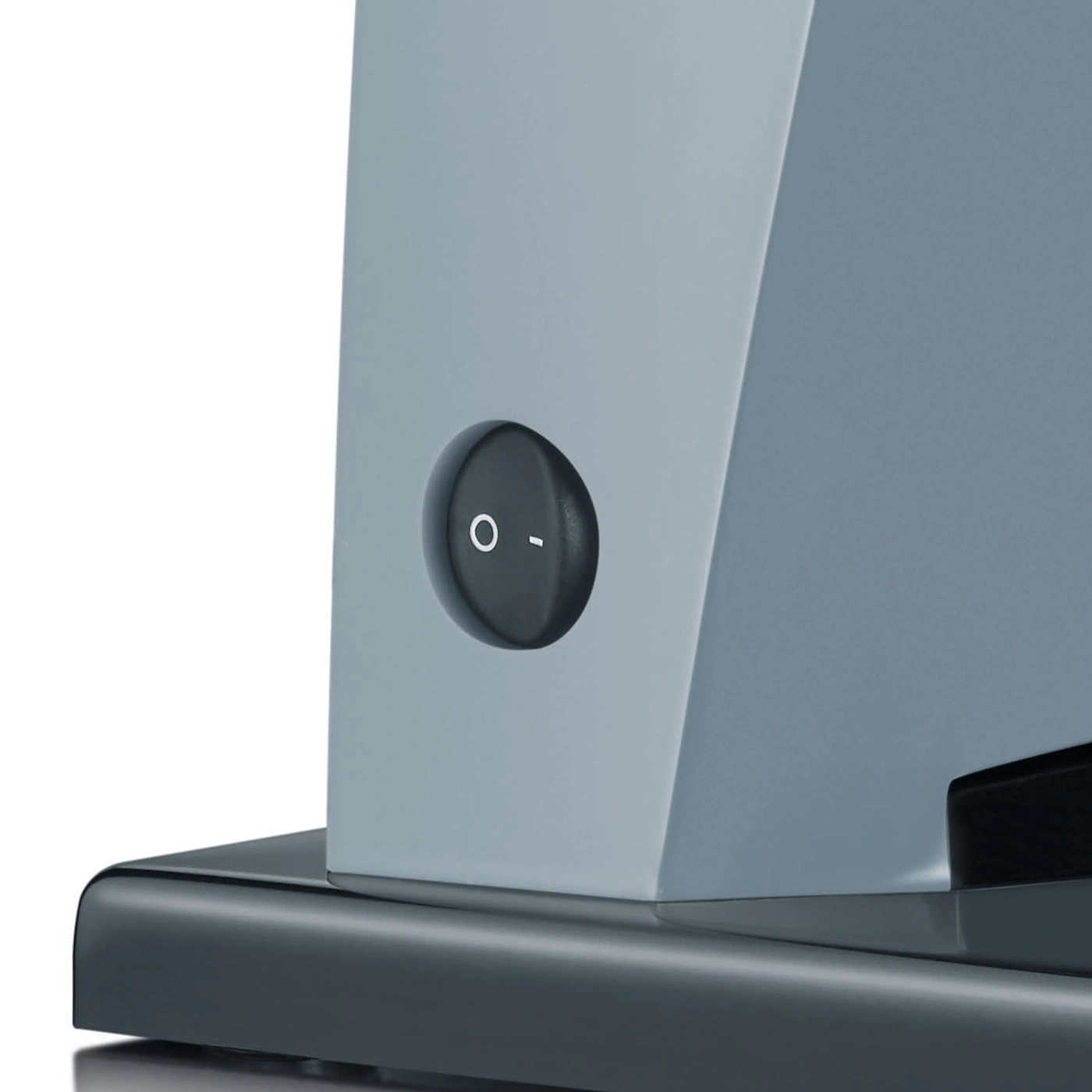 Gray switch with on/off symbols on a gray device.