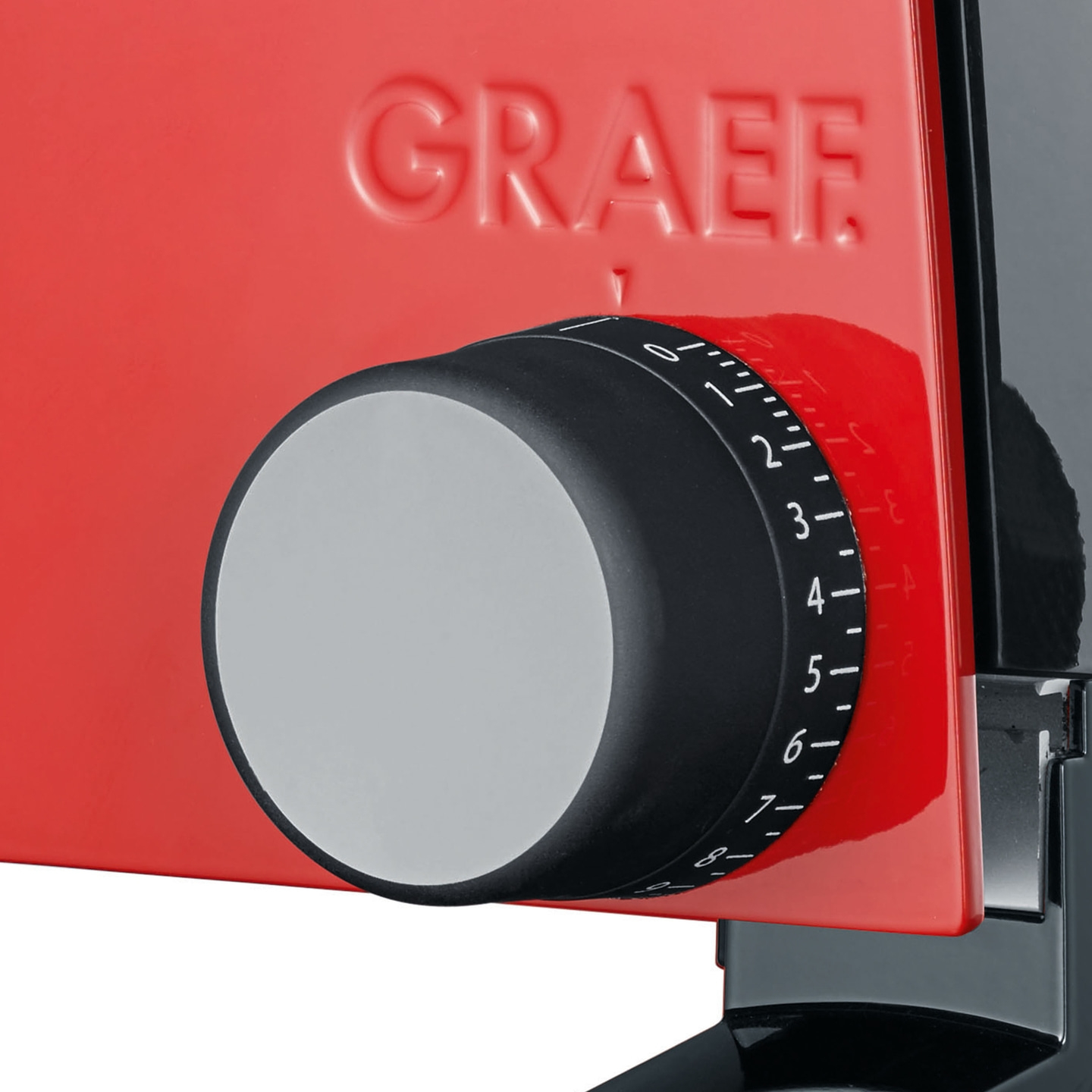 Red Graef food slicer with adjustment knob and scale