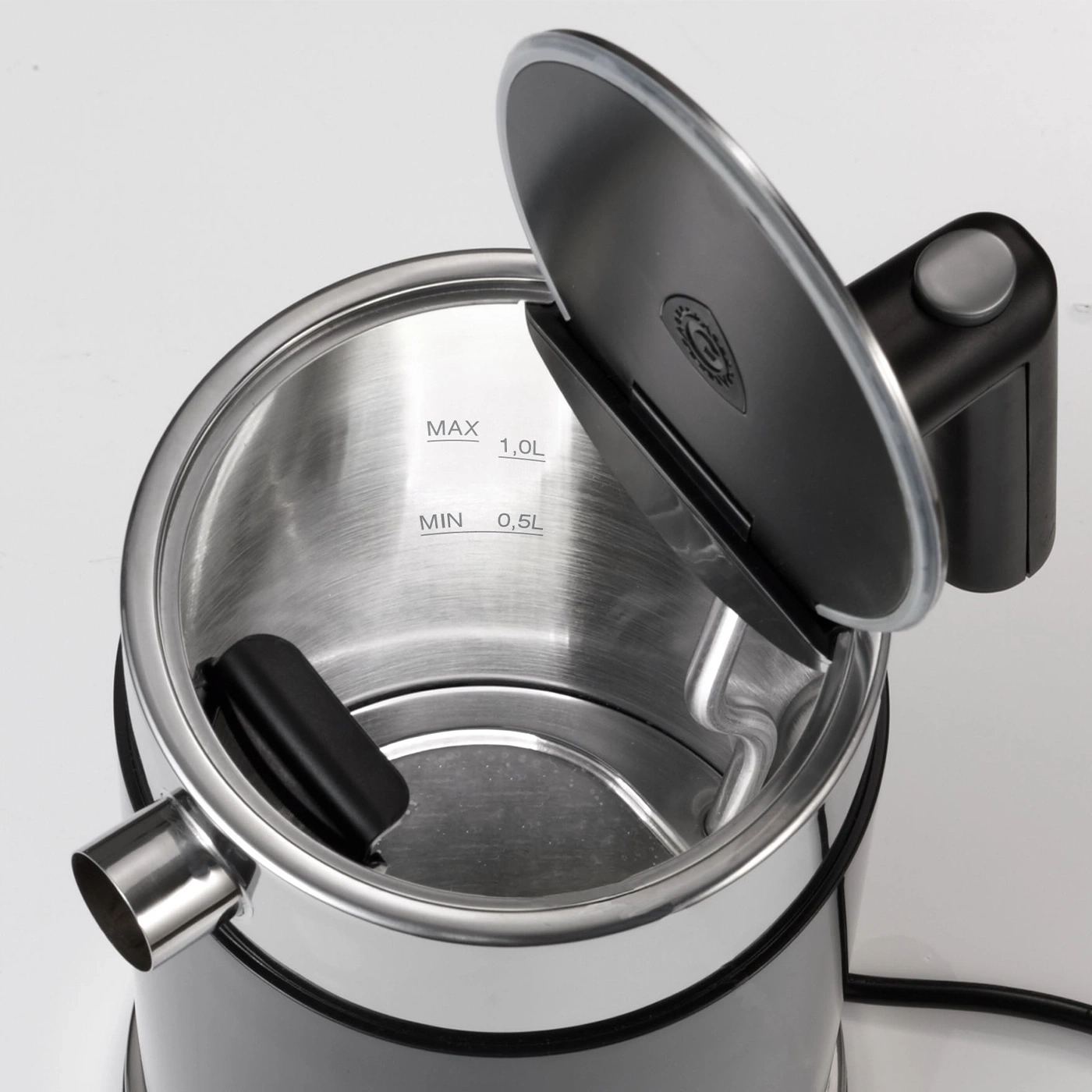 Kettle with open lid, stainless steel, black, inside view, close-up shot
