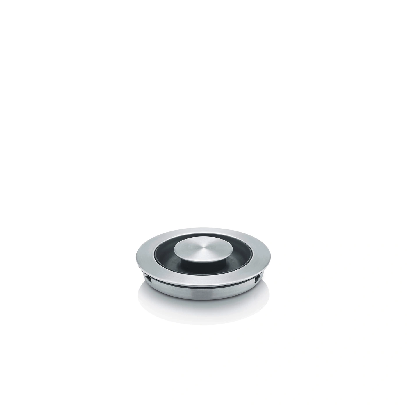 Metal button, round, silver, shiny, isolated on white background, close-up