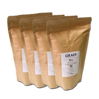 Vier Kaffeepackungen mit der Aufschrift GRAEF Espresso Coffein Wecker.