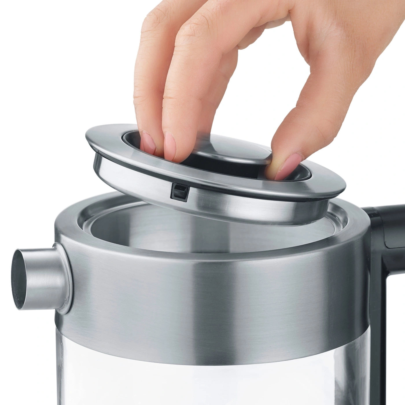 Hand opening the lid of a stainless steel kettle, close-up shot