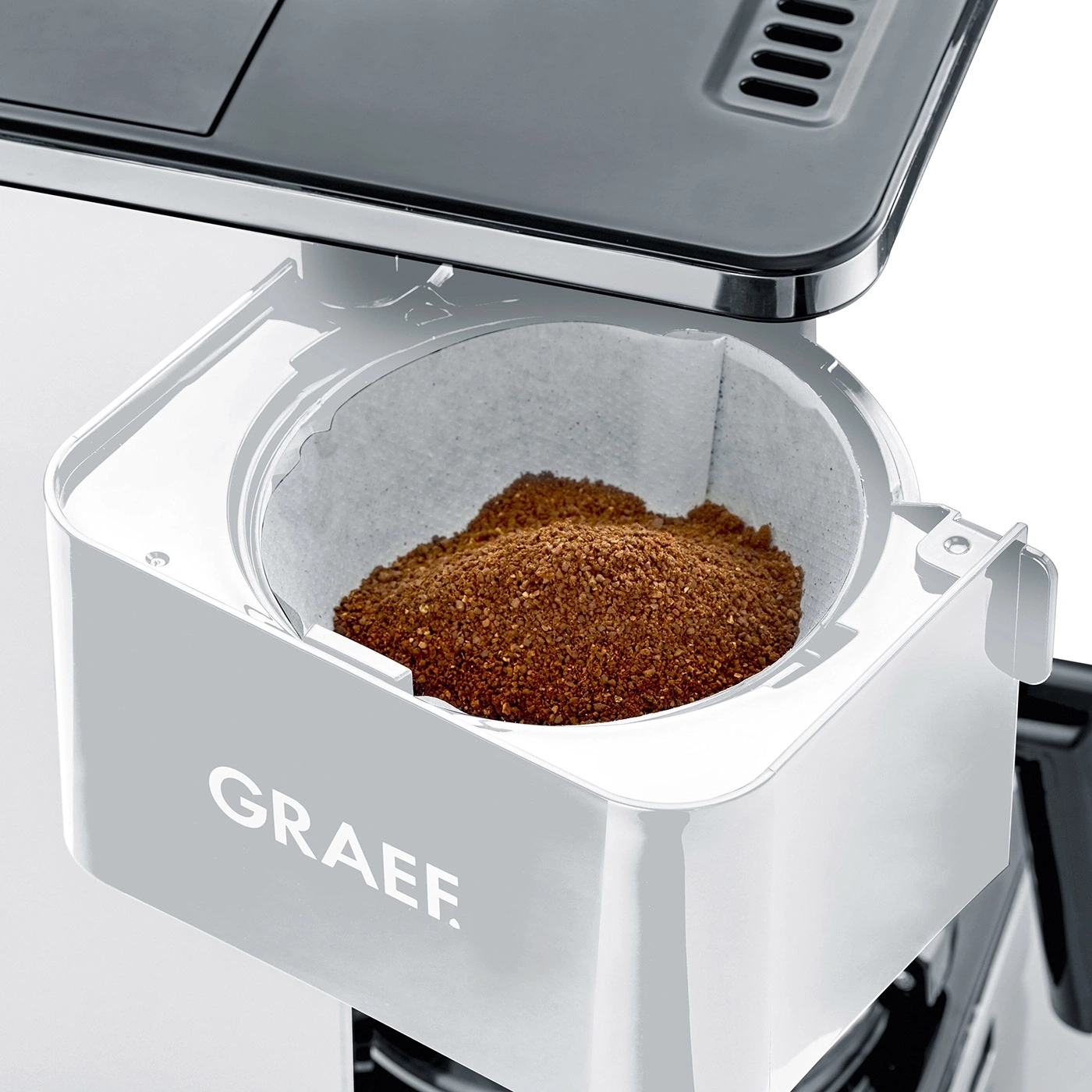 Coffee machine with filter and coffee grounds, close-up, GRAEF logo visible