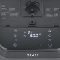 Bread maker with menu selection and digital display showing time and settings.