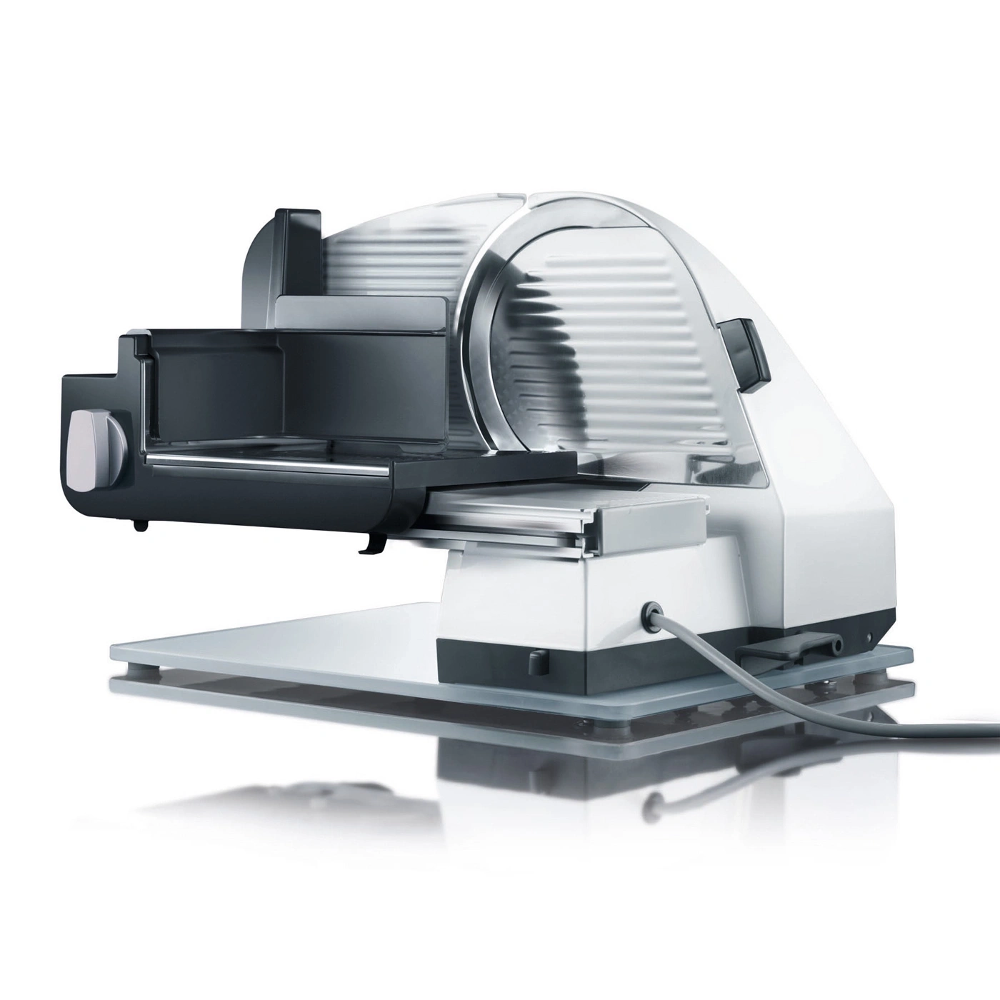 Electric food slicer, stainless steel, white and black, isolated on white