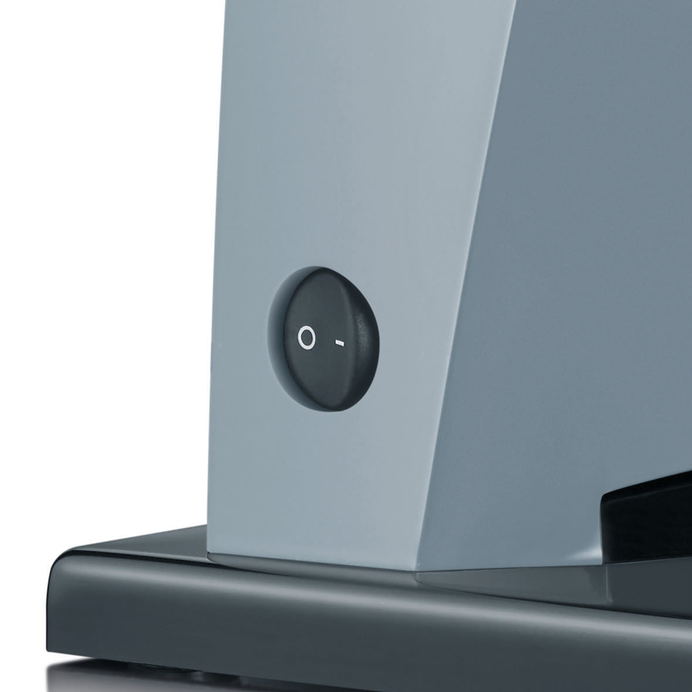 Gray switch with on/off symbols on a gray device.