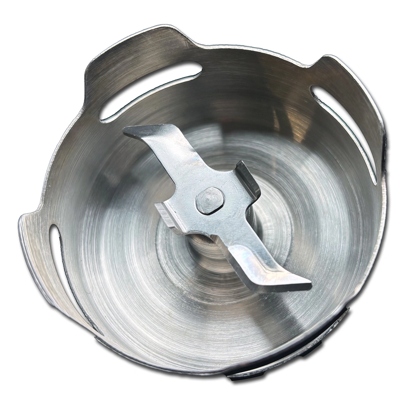 Close-up of a stainless steel blender attachment with blades and holes