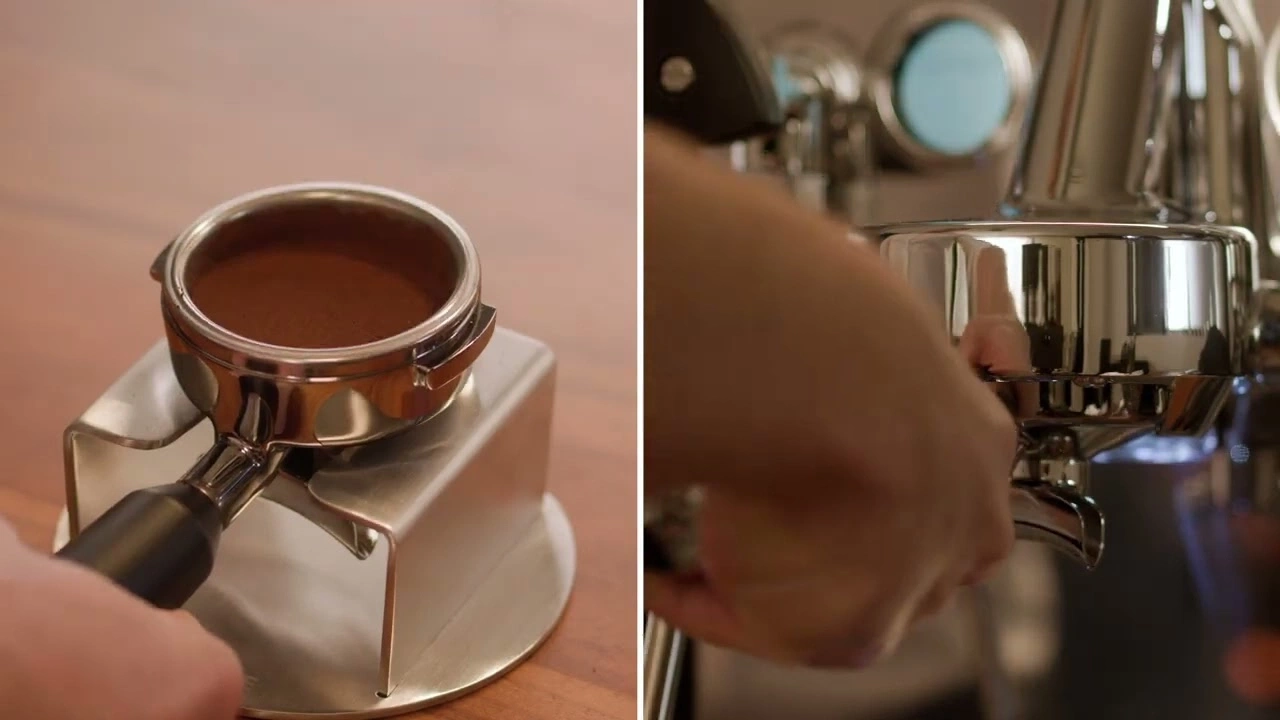 Coffee preparation: portafilter with coffee powder being inserted into the machine.