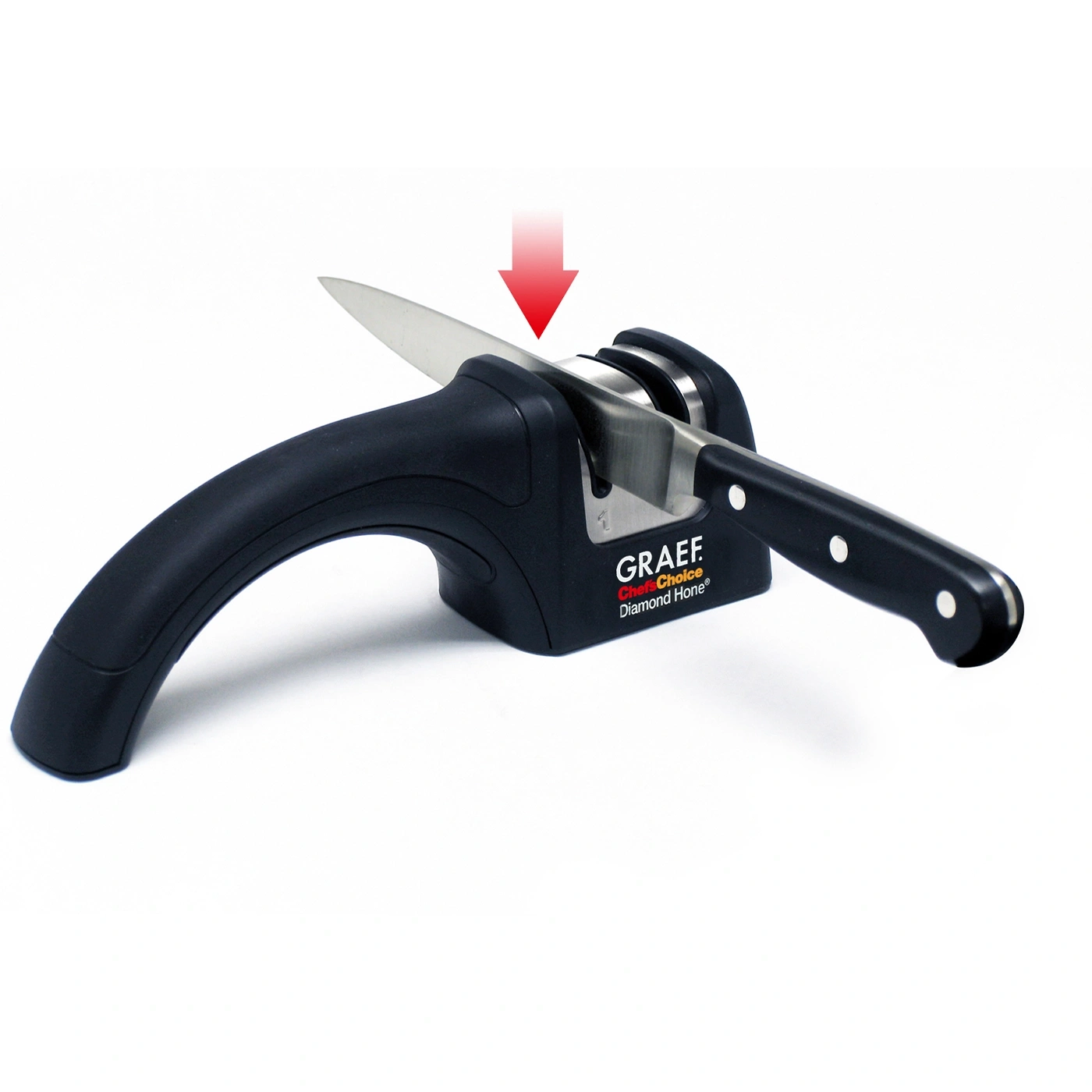 Knife being sharpened with a sharpener, arrow pointing downwards, black handle.