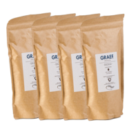 Four coffee bags with GRAEF, Excelso, Whole Beans, 250g, Arabica written on them