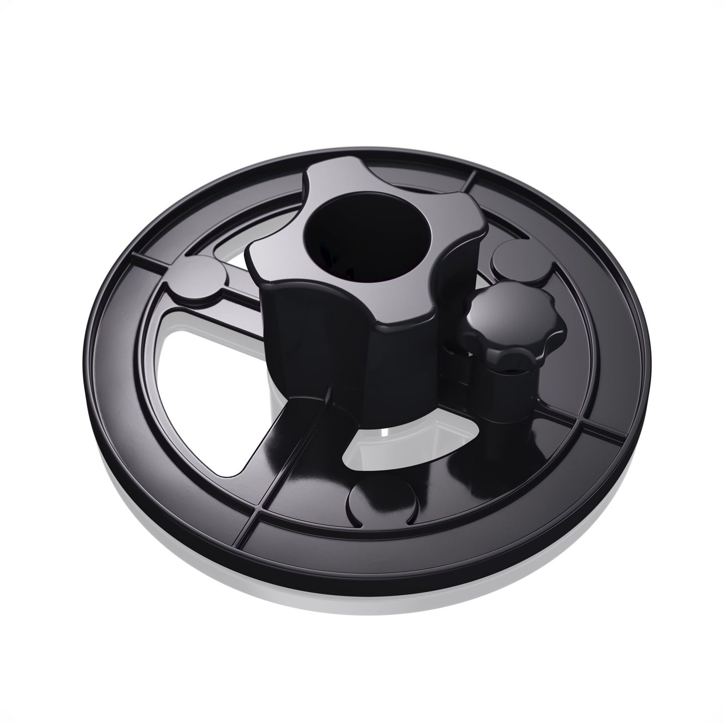 Schwarzes Kunststoffteil mit Knöpfen und Löchern, isoliert auf weißem Hintergrund.