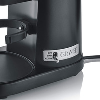 Black coffee machine with GRAEF logo and switch for on, off, and auto settings.