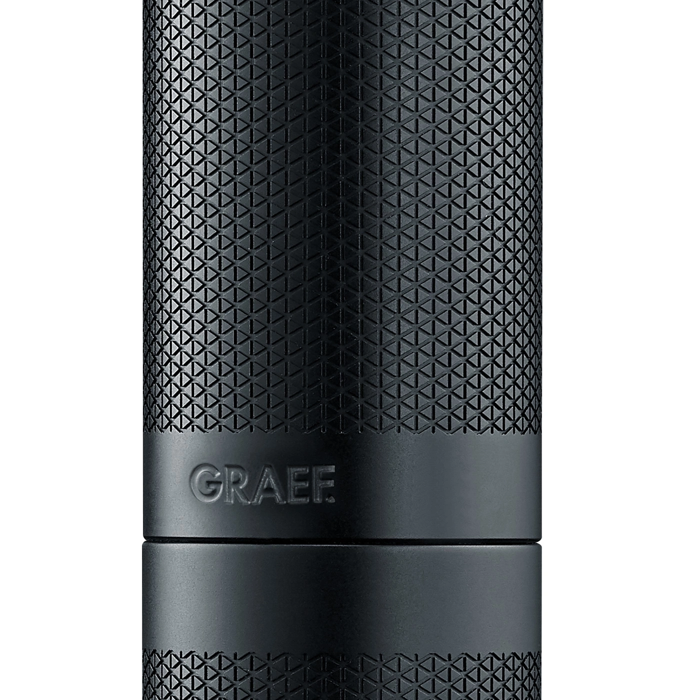 Black cylinder with geometric pattern and GRAEF logo. Elegant design and texture.