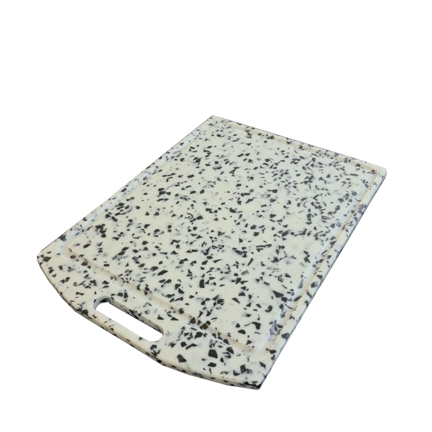 Cutting board with white and black pattern and handle