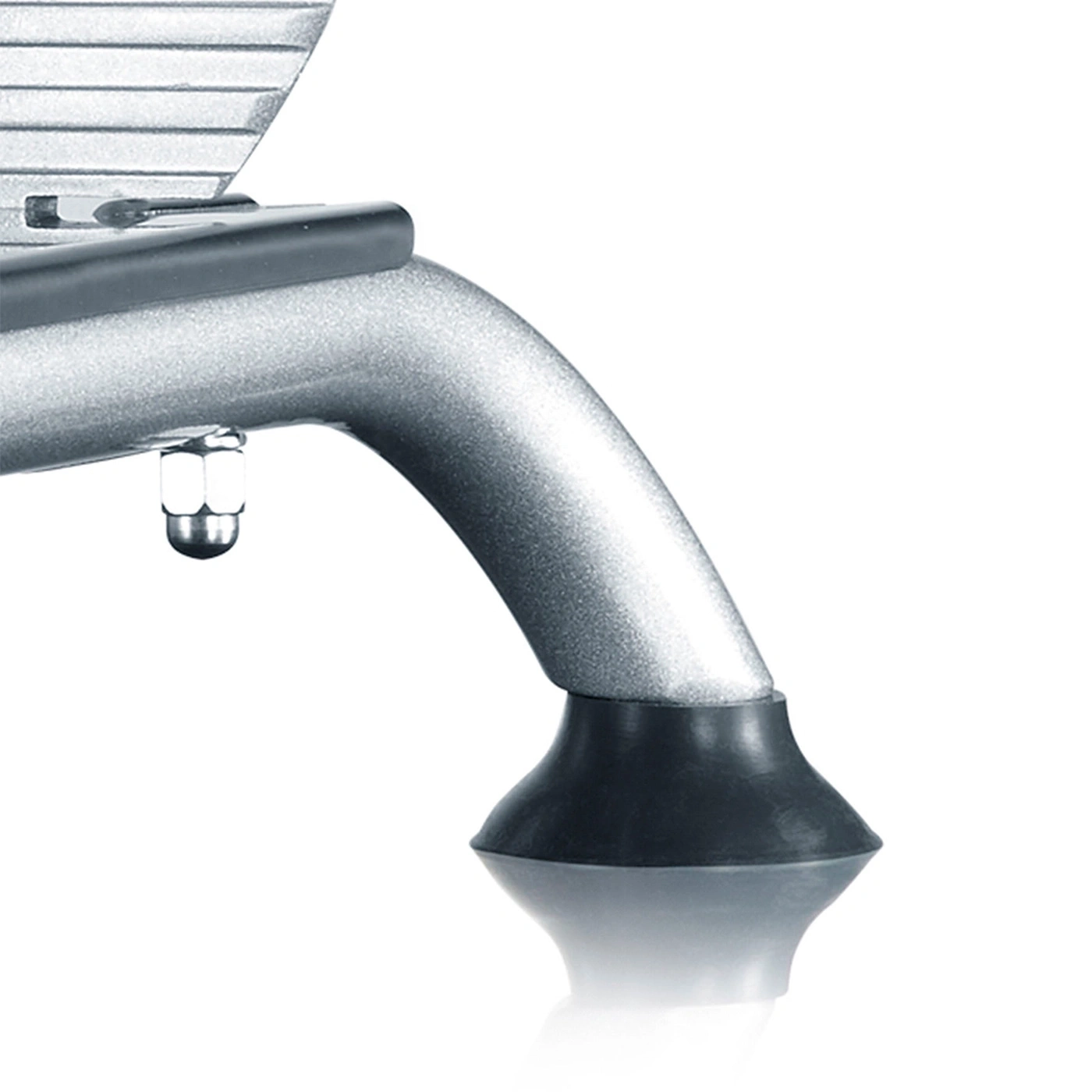 Close-up of a silver metal foot with a black rubber foot and a screw detail