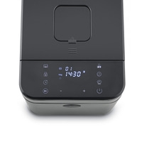 Black bread maker with display and controls. Baking, time, and weight settings.