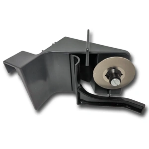 Gray tool with a round blade for cutting materials, likely fabric or paper.