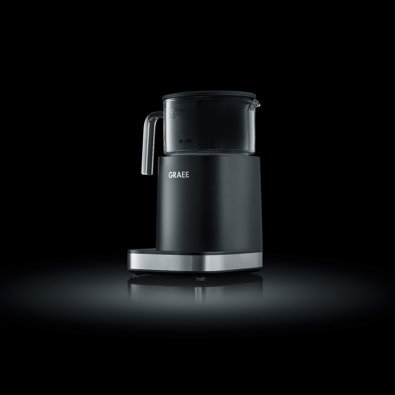 Black coffee machine with glass container and GRAEF logo on a black background.
