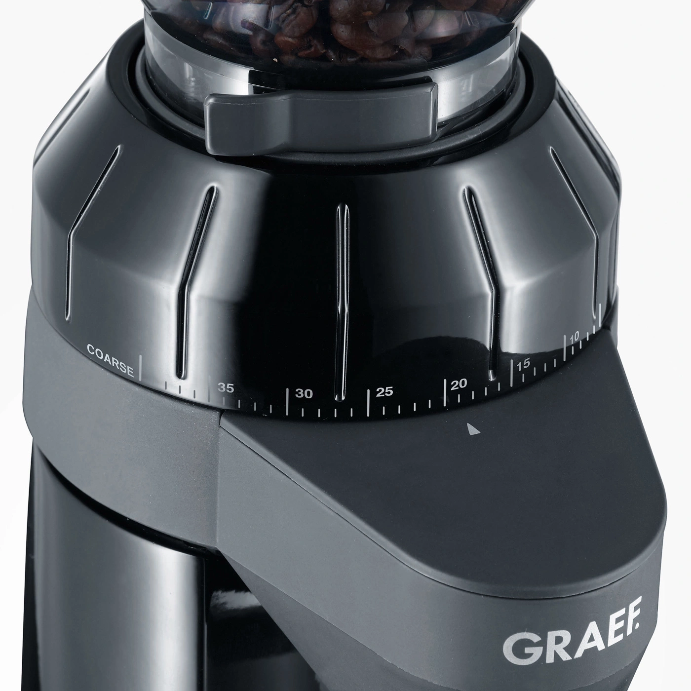 Close-up of a coffee grinder with grind setting and "GRAEF" logo.