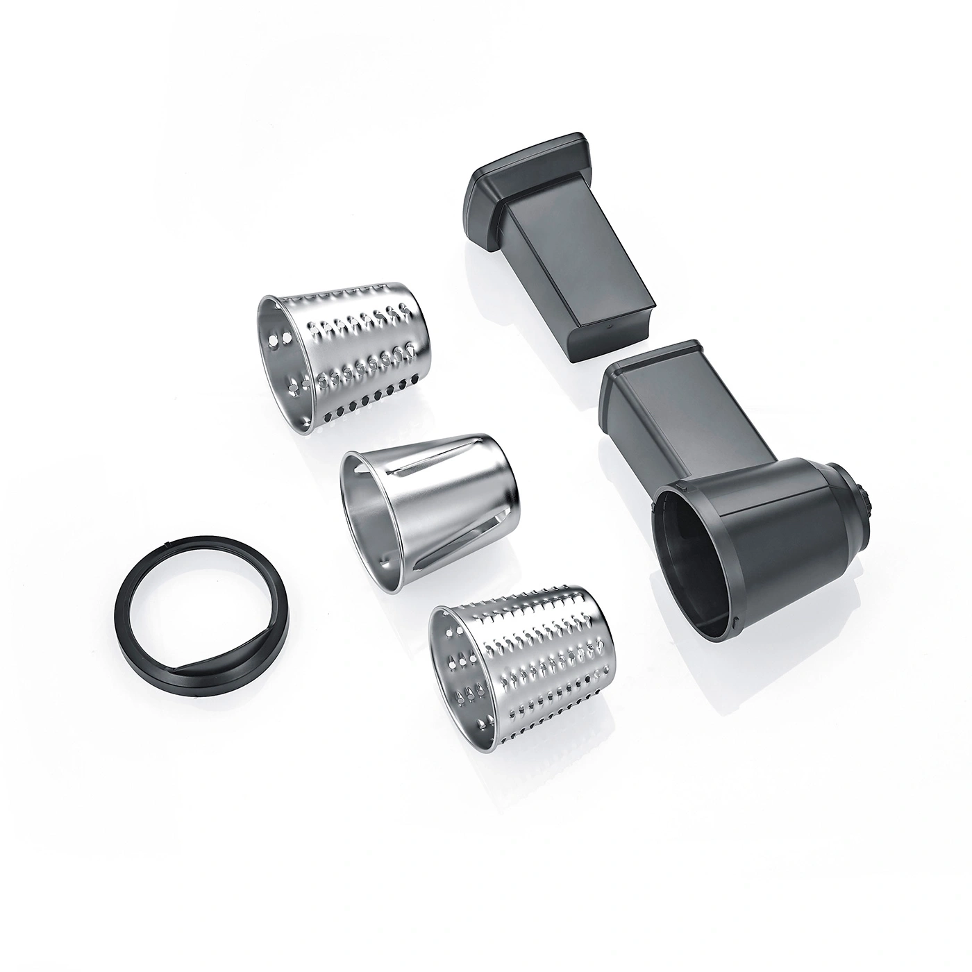 Grater attachments and parts on white background, kitchen utensils, food preparation.