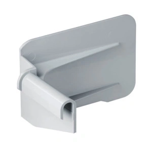 Gray plastic holder that can be attached to a wall for support.