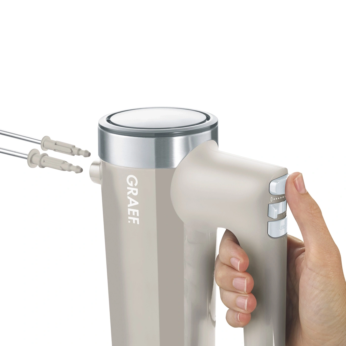 Handmixer mit Hand einer Person, die die Geschwindigkeit einstellt, Nahaufnahme