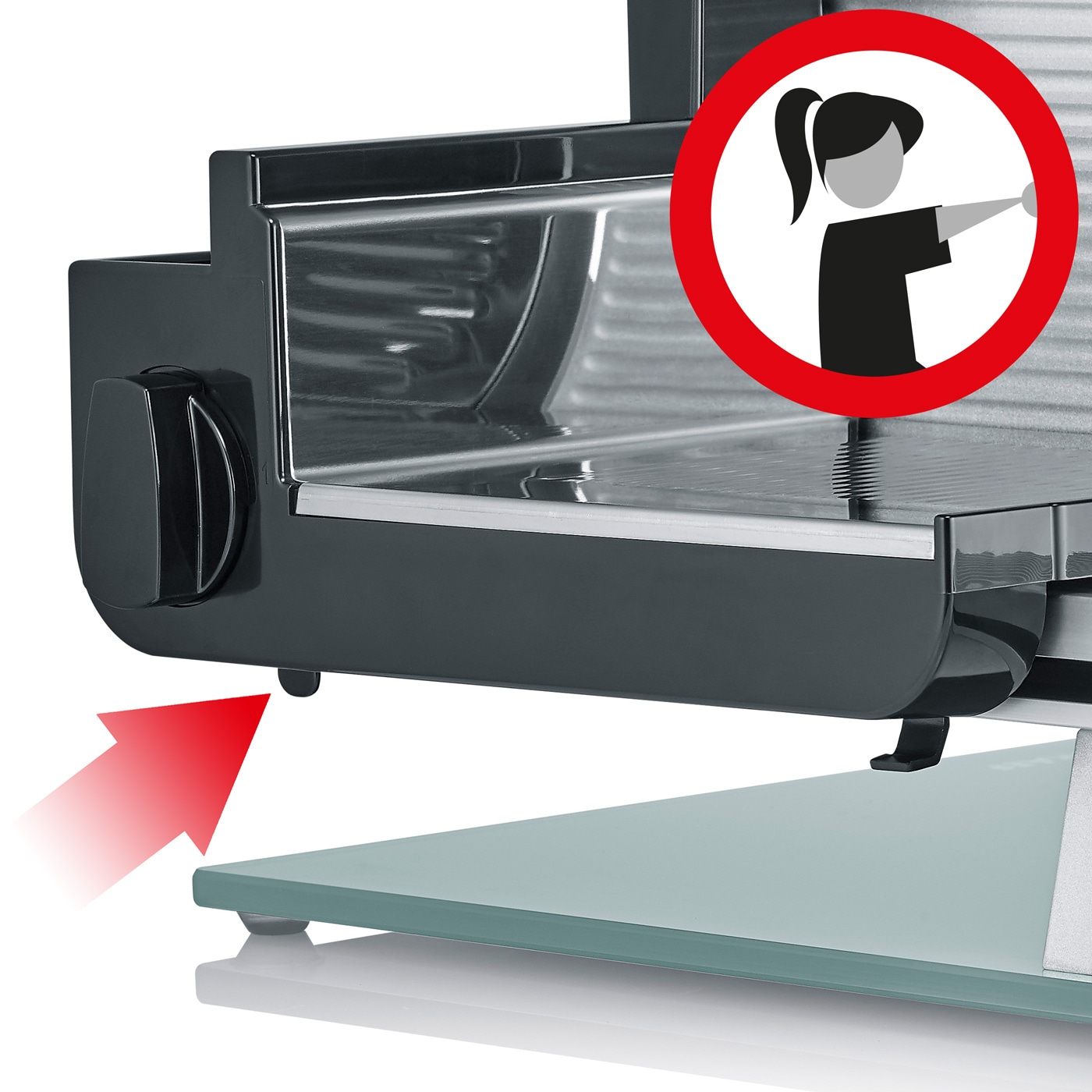 Meat slicer with red arrow and safety warning symbol for use