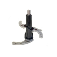 Schwarzes Küchengerät mit transparenten Klingen auf weißem Hintergrund.